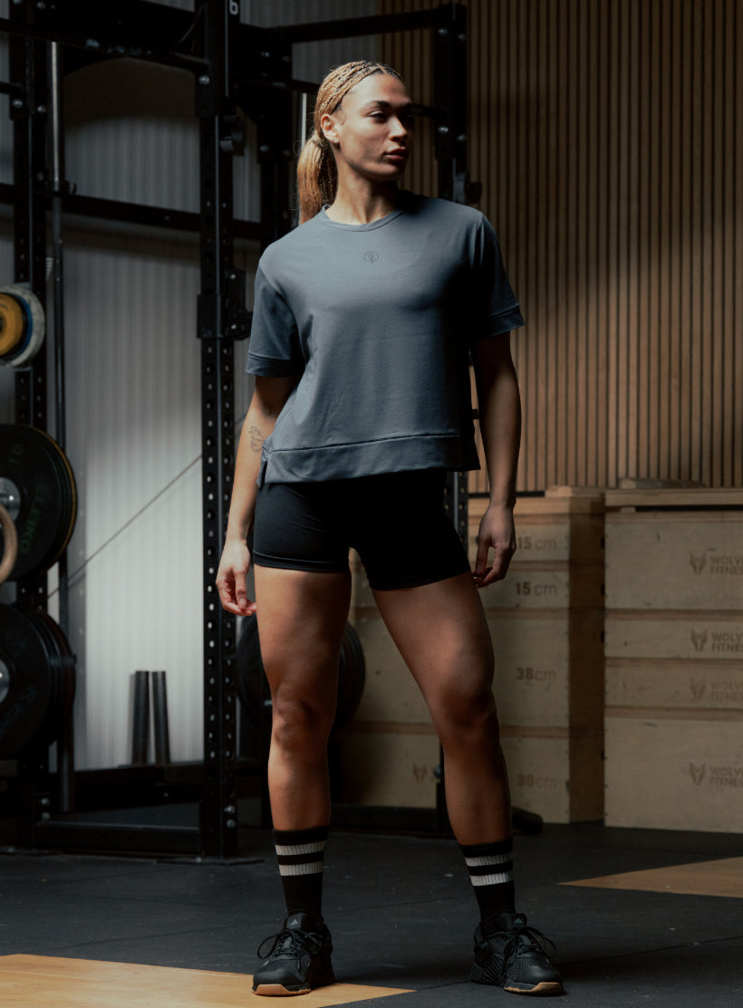 An in the field image of Women's Force Boxy DriRelease T-Shirt in Ombre Blue (ITF)