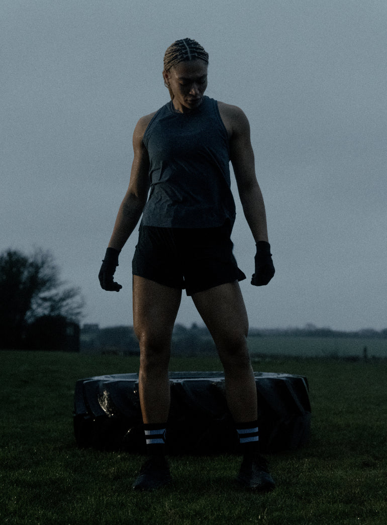An in the field image of Women's Force DriRelease Tank Vest in Ombre Blue (ITF)