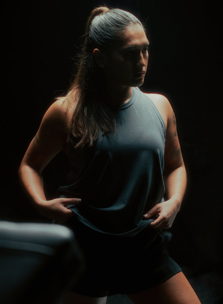 A creative studio shot of Women's Force DriRelease Tank Vest in Ombre Blue (CS)