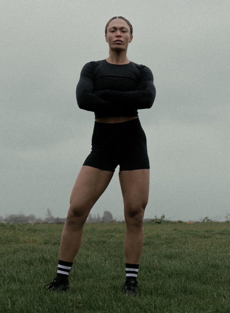 An in the field image of Women's Force Seamless Shorts in Obsidian Black (ITF)