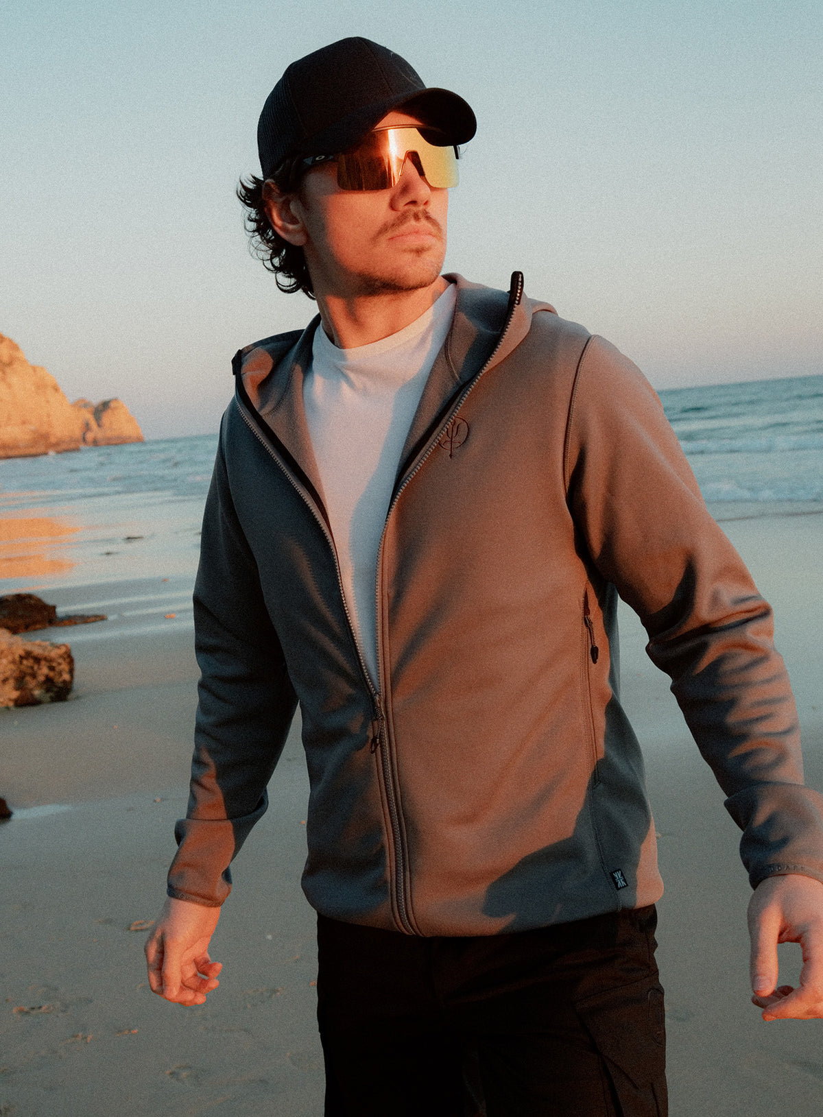 An in the field image of Forward Hoodie in Antimony Grey (ITF)