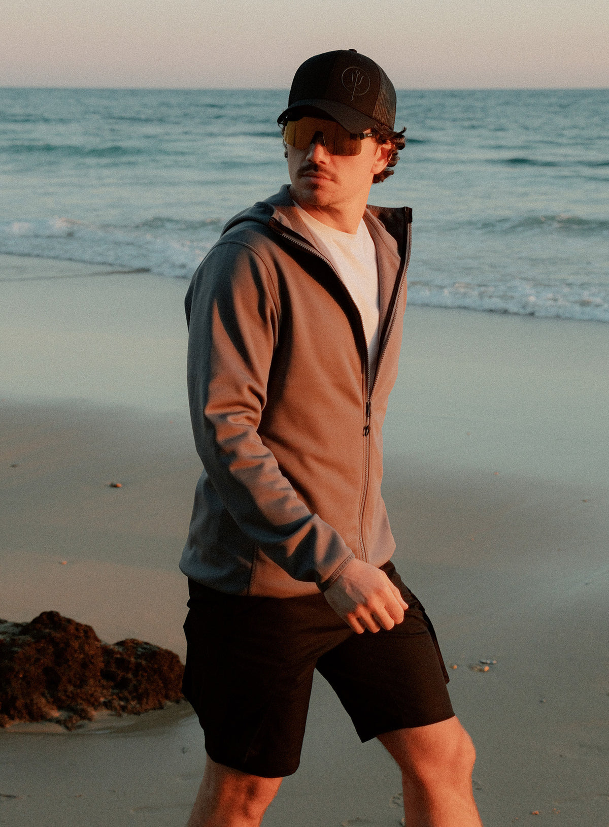 An in the field image of Forward Hoodie in Antimony Grey (ITF)