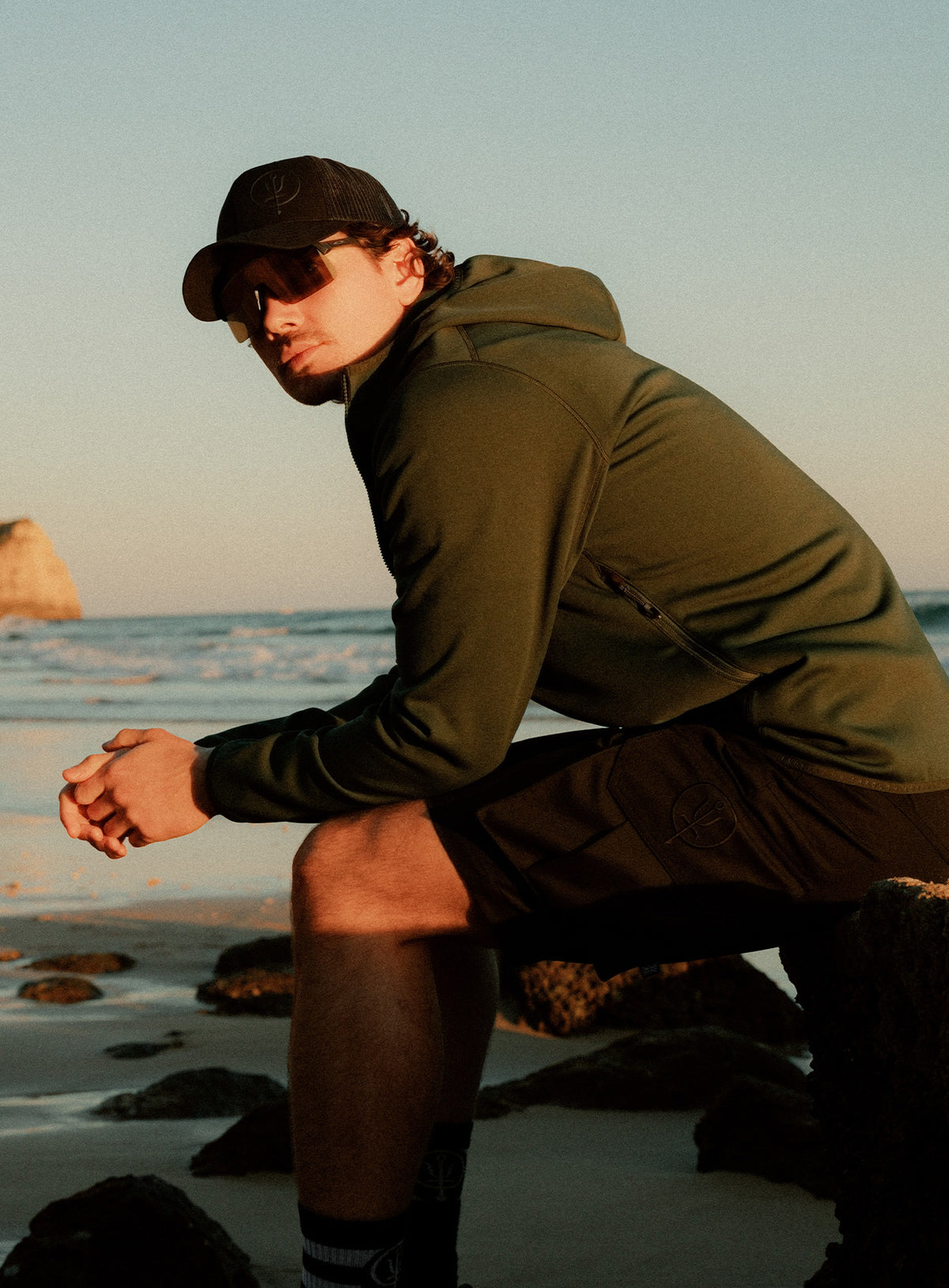 An in the field image of Forward Hoodie in Forest Green (ITF)