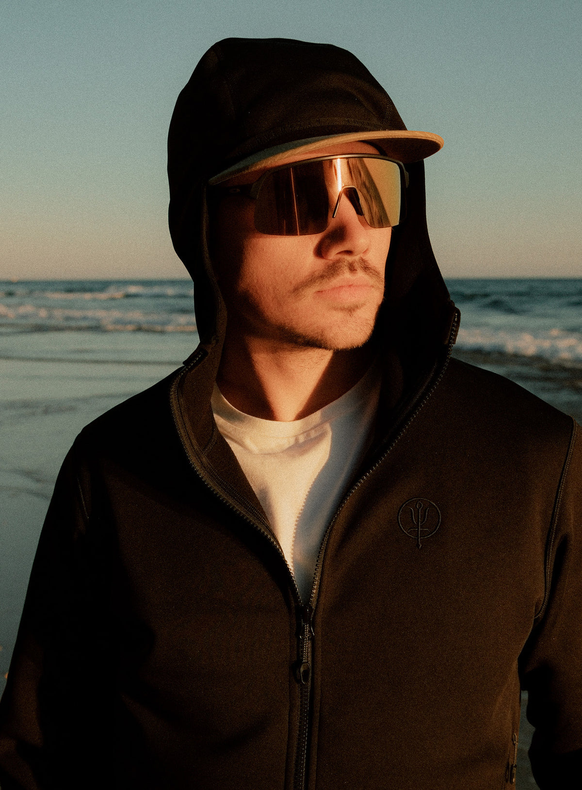 An in the field image of Forward Hoodie in Obsidian Black (ITF)