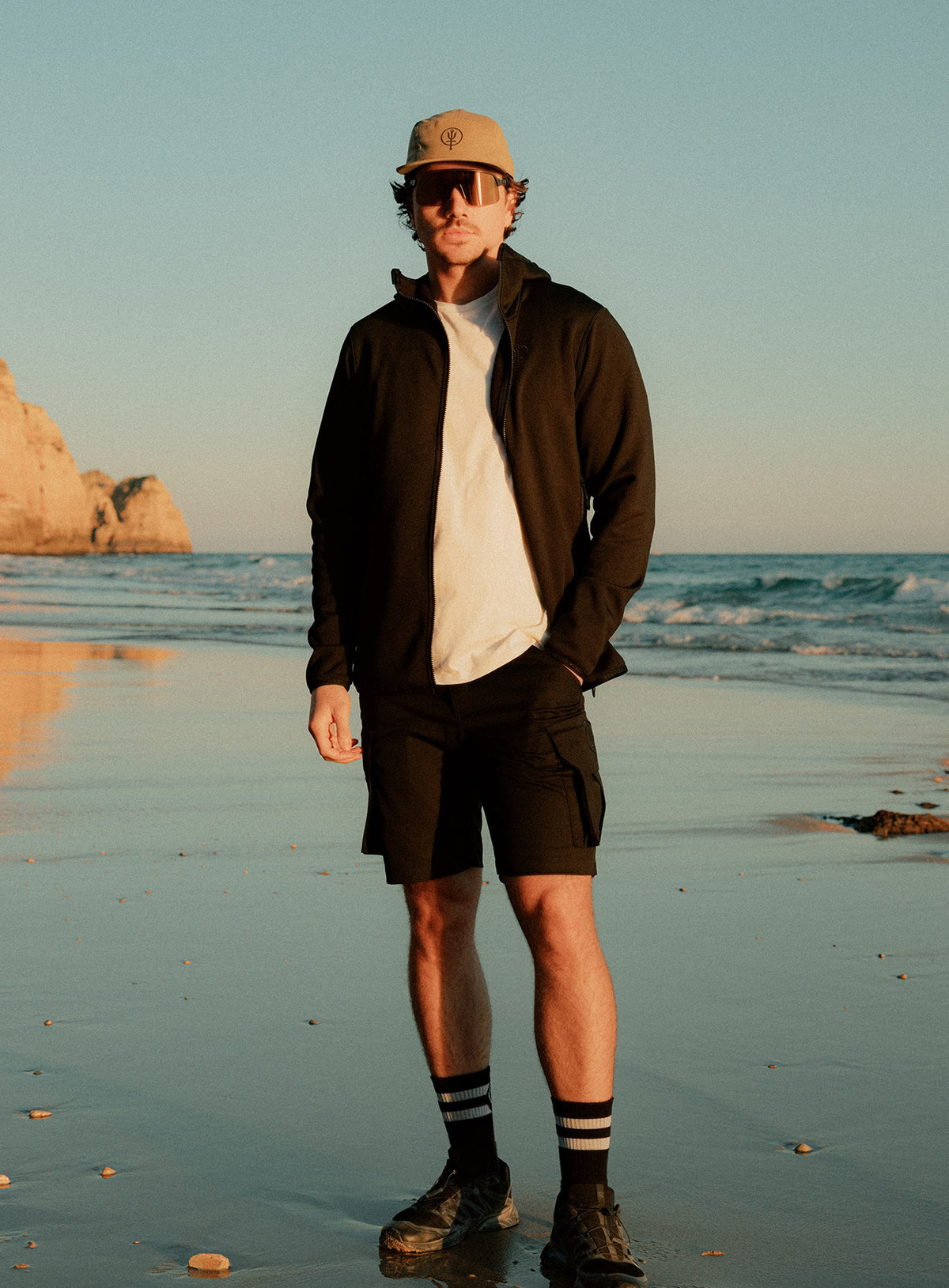 An in the field image of Forward Hoodie in Obsidian Black (ITF)