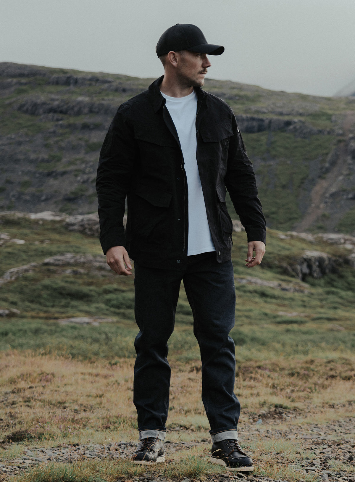 An in the field image of Hybrid Jacket in Obsidian Black (ITF)