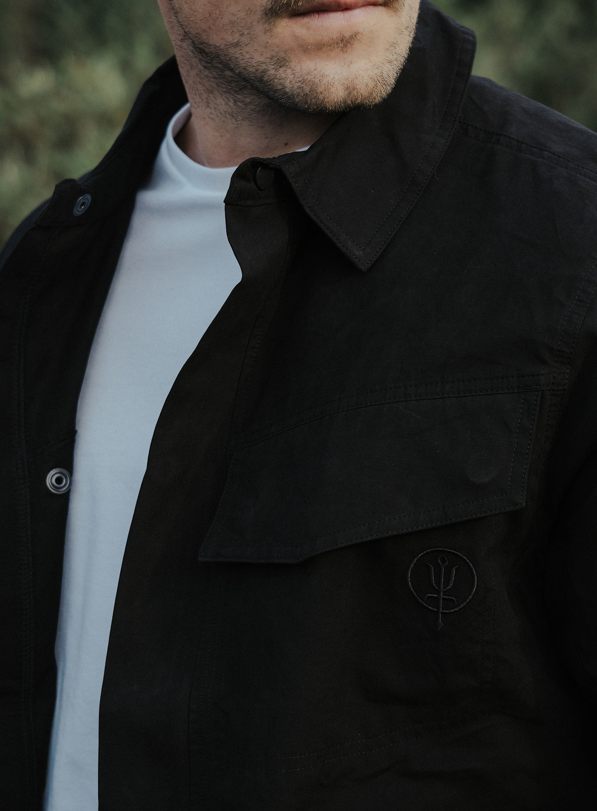 An in the field image of Hybrid Jacket in Obsidian Black (ITF)