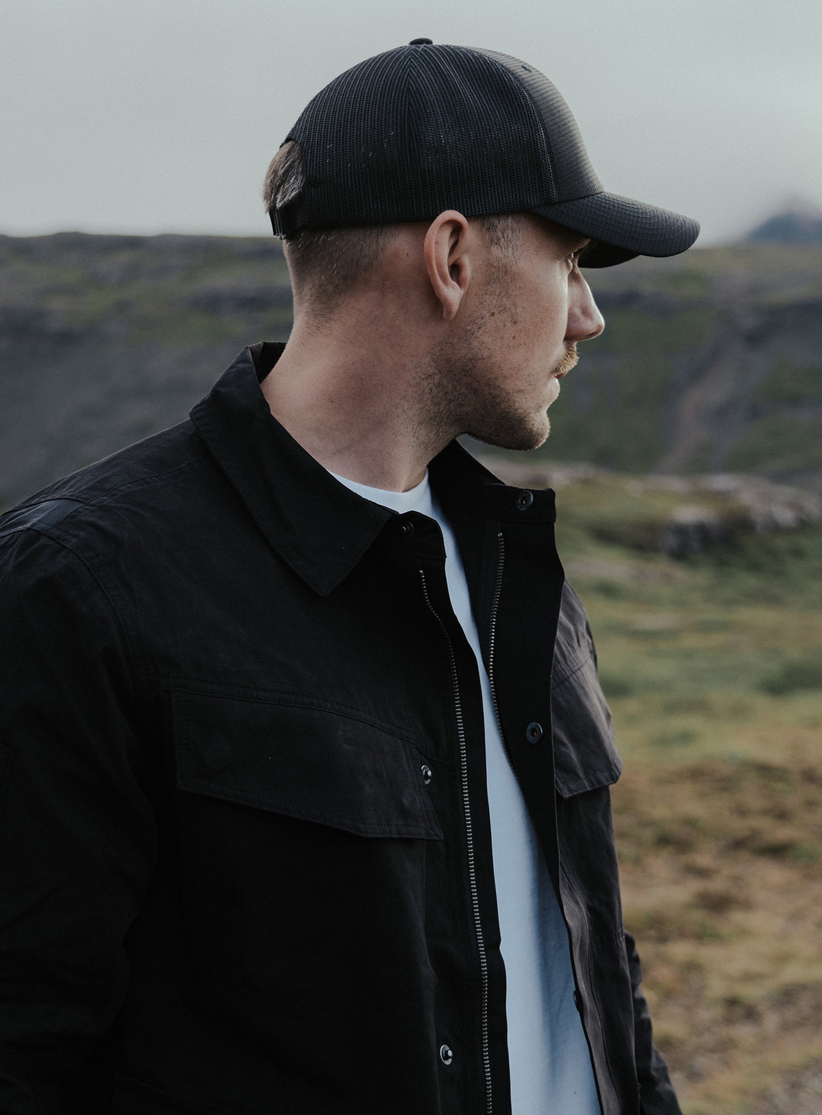 An in the field image of Hybrid Jacket in Obsidian Black (ITF)