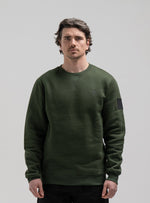 A studio shot of Insignia Jumper in Forest Green (SS)