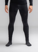 A studio shot of Men's Mountain Pro Merino Cordura Base Layer Bottoms in Obsidian Black (SS)