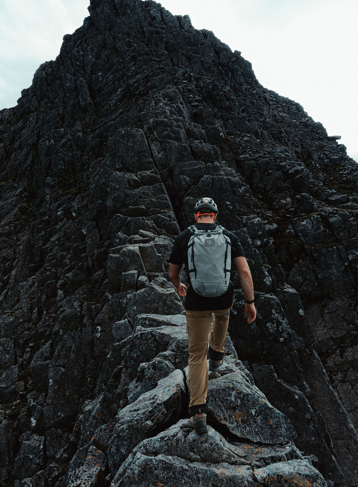 An in the field image of Orbital 30L Dyneema Climbing Backpack in Antimony Grey (ITF)