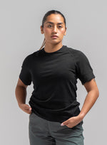 A studio shot of Women's Oryon 72HR Merino T-Shirt in Obsidian Black (SS)