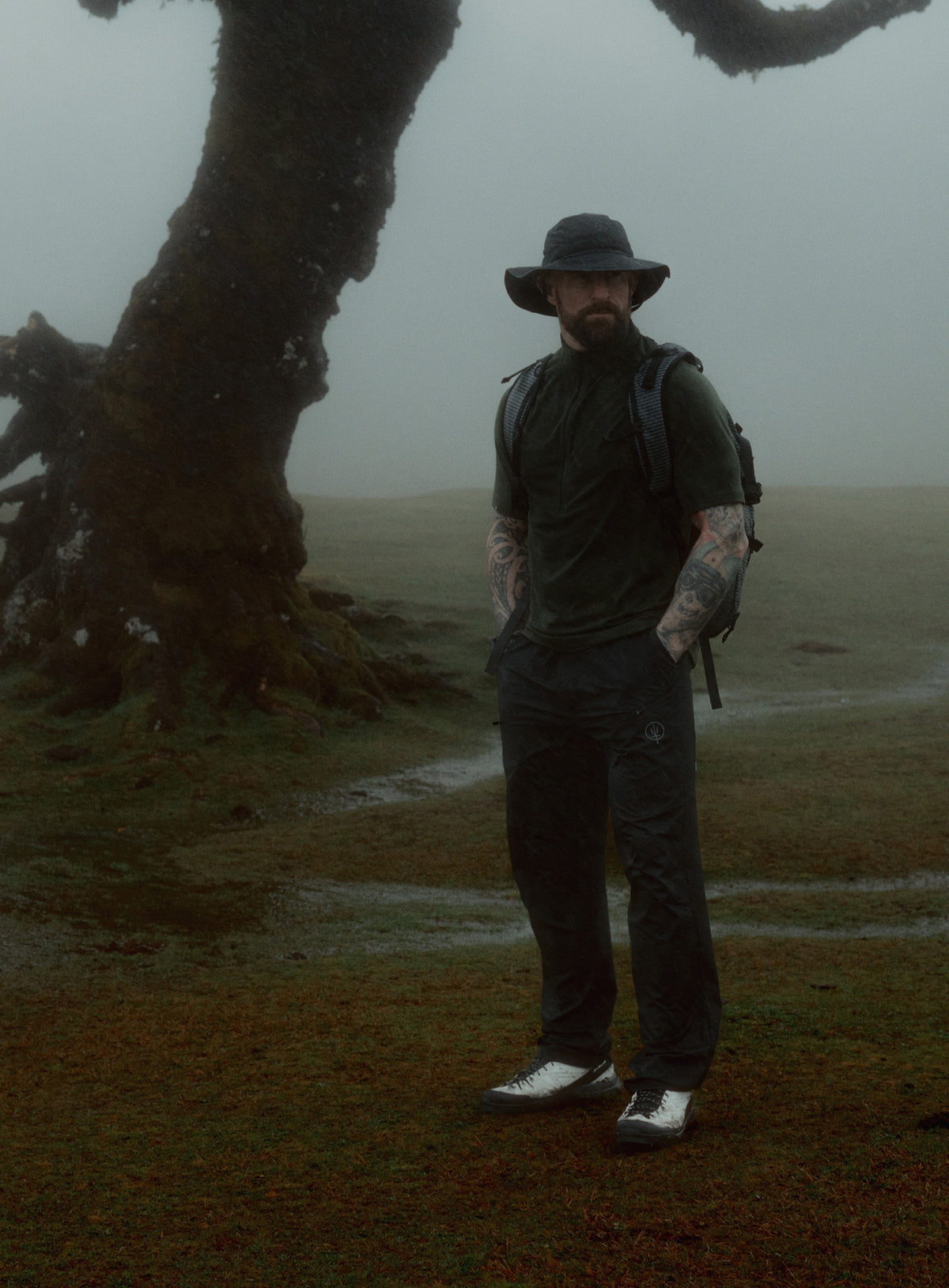 An in the field image of Men's Oryon Delta T-Shirt in Forest Green (ITF)