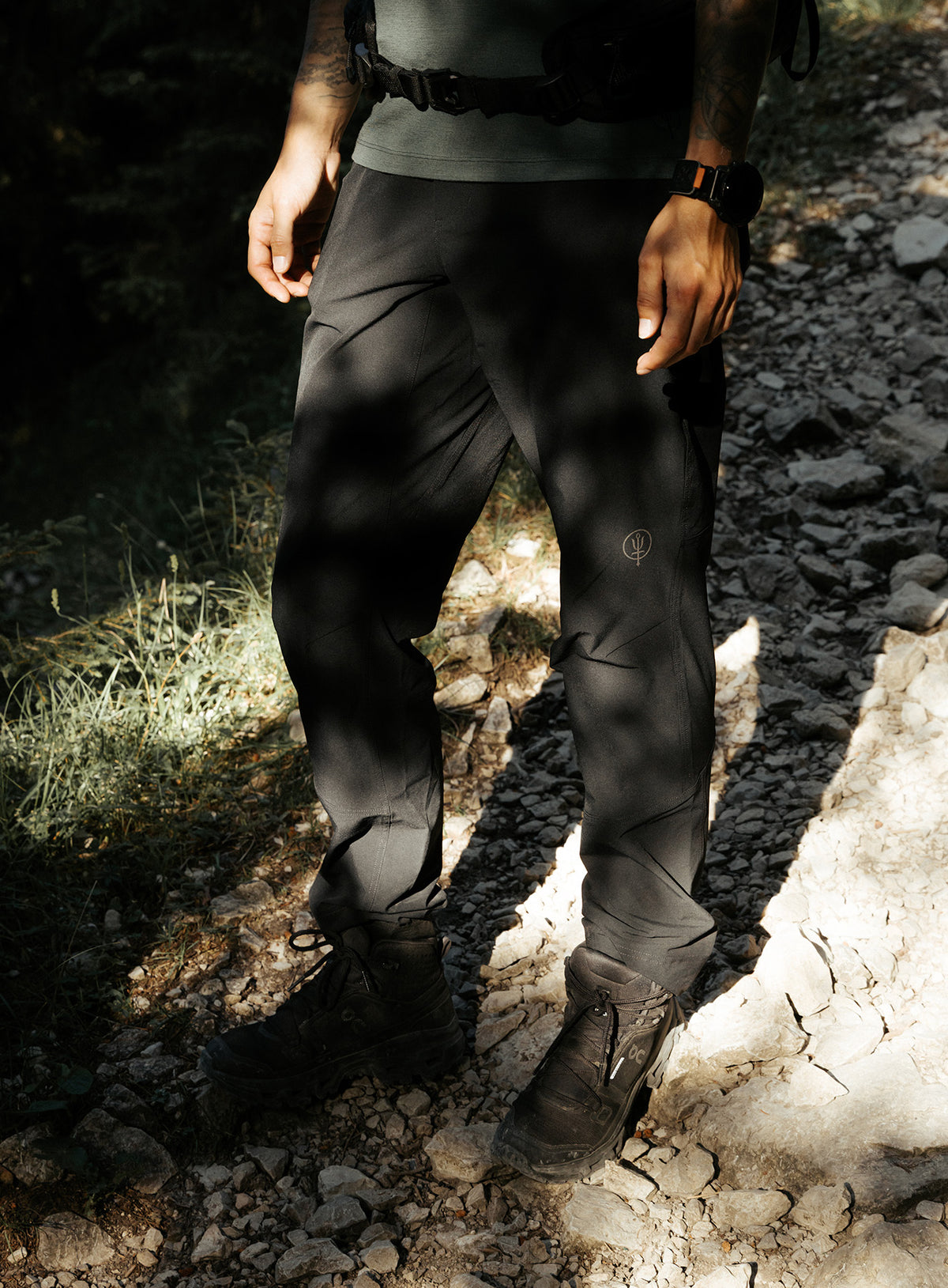 An in the field image of Women's Oryon Trousers in Obsidian Black (ITF)