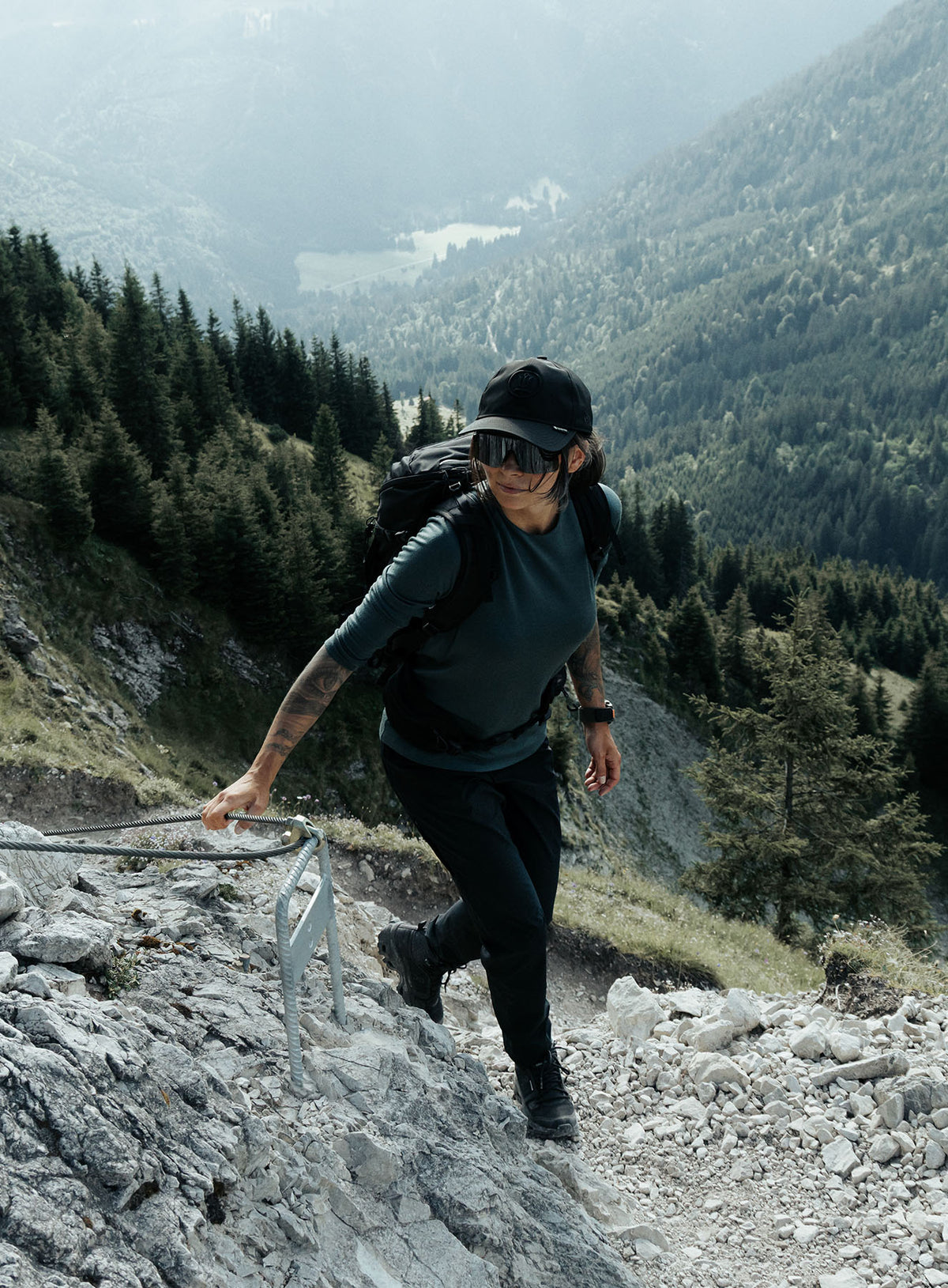 An in the field image of Women's Oryon Trousers in Obsidian Black (ITF)