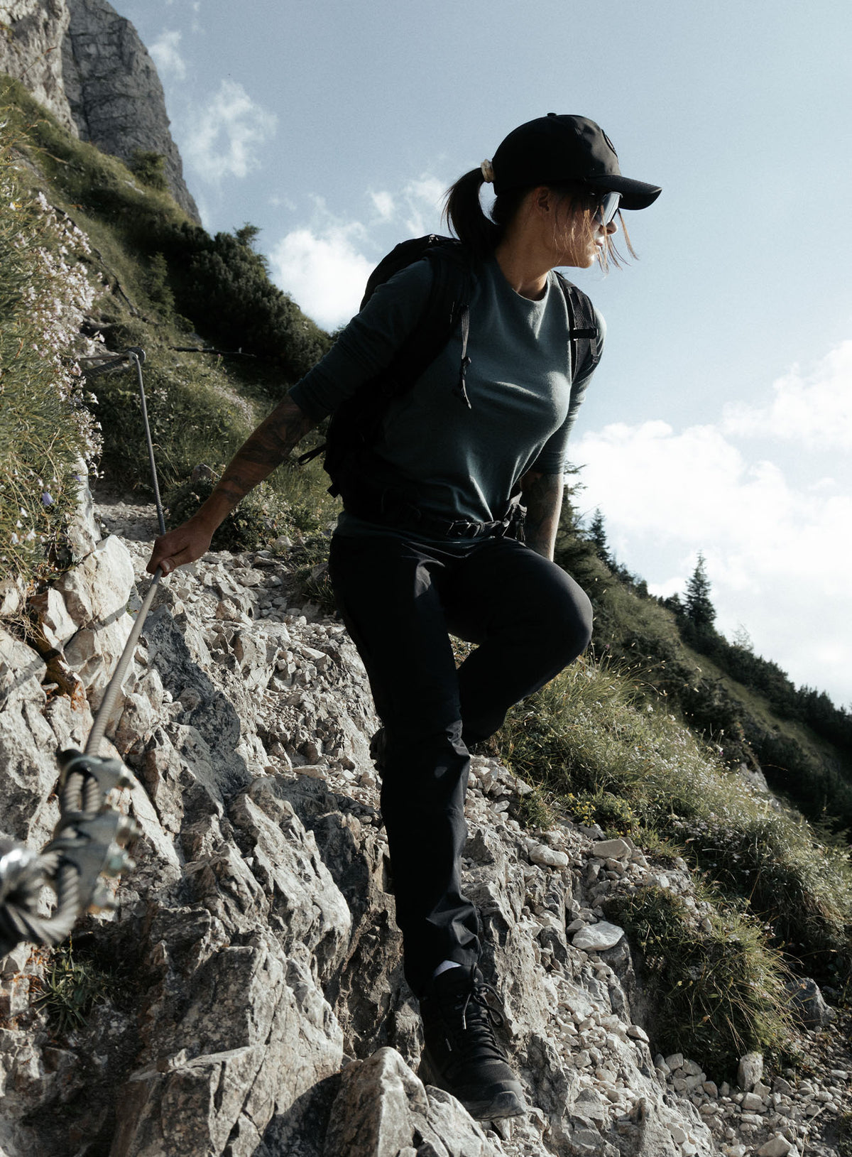 An in the field image of Women's Oryon Trousers in Obsidian Black (ITF)
