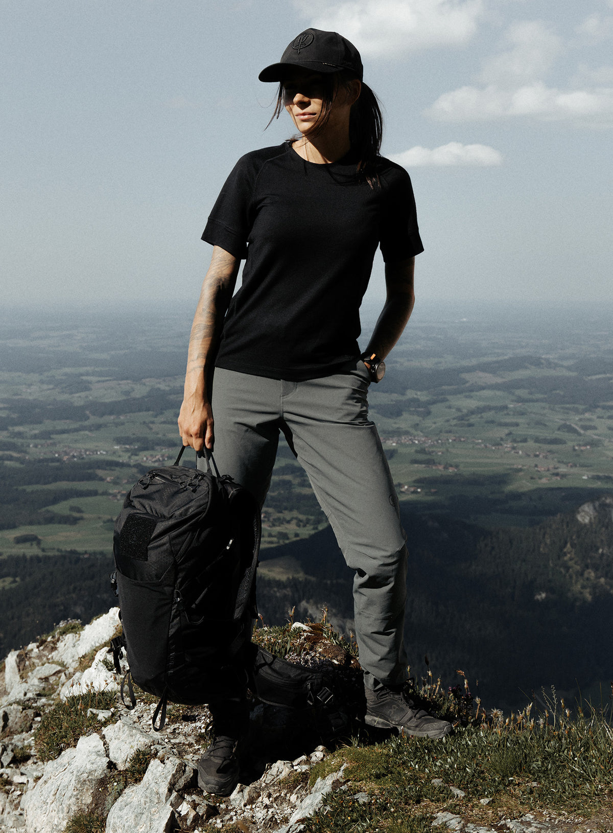 An in the field image of Women's Oryon Trousers in Urban Green (ITF)