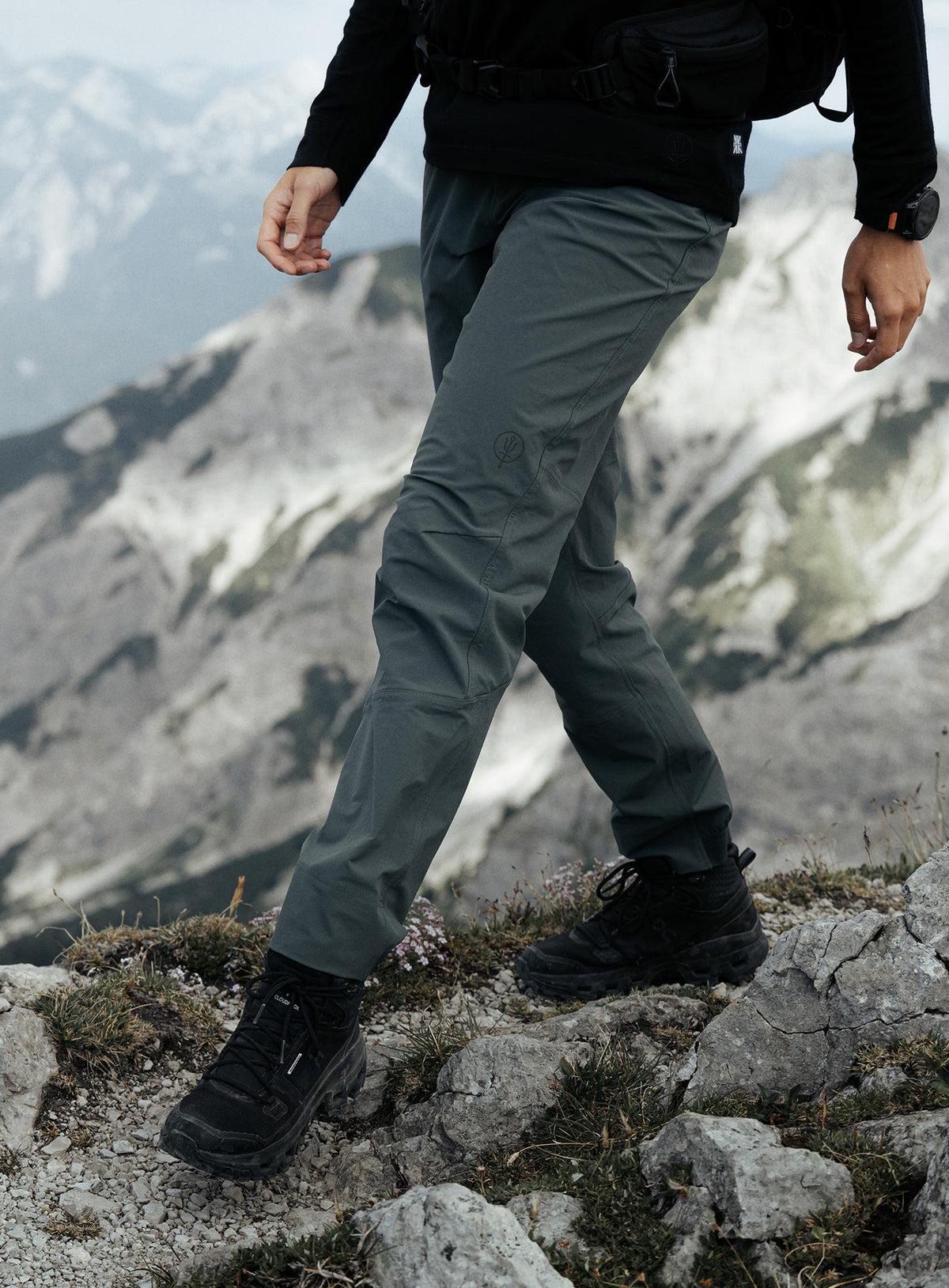 An in the field image of Women's Oryon Trousers in Urban Green (ITF)