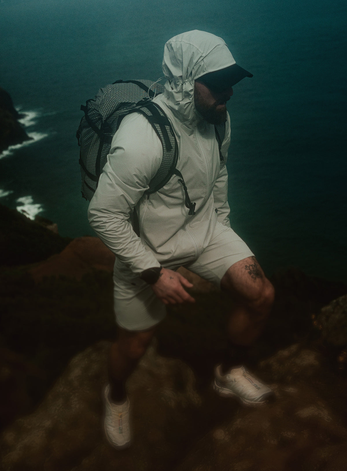 An in the field image of Oryon Windguard Jacket in Grey (ITF)