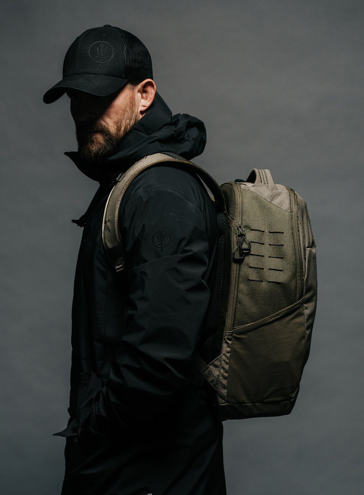 A creative studio shot of Phantom 25L Backpack in Olive Green (CS)
