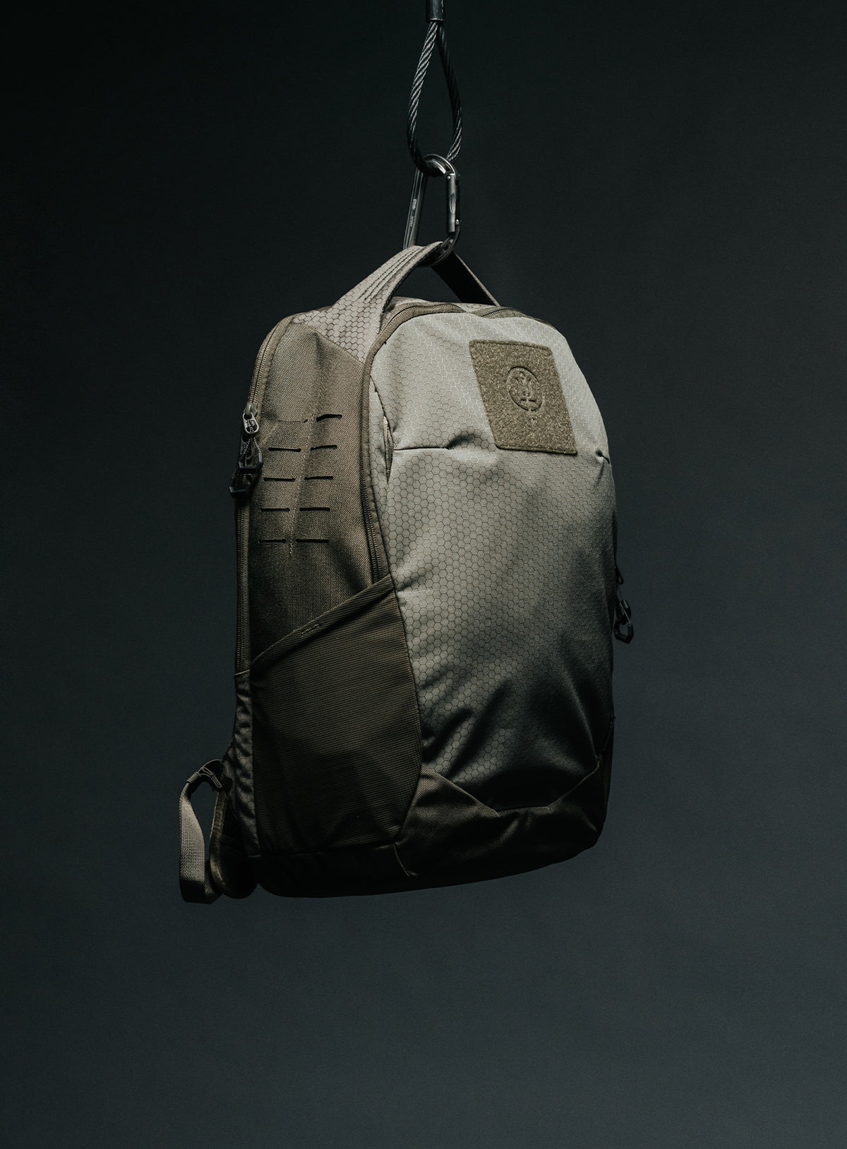 A creative studio shot of Phantom 25L Backpack in Olive Green (CS)