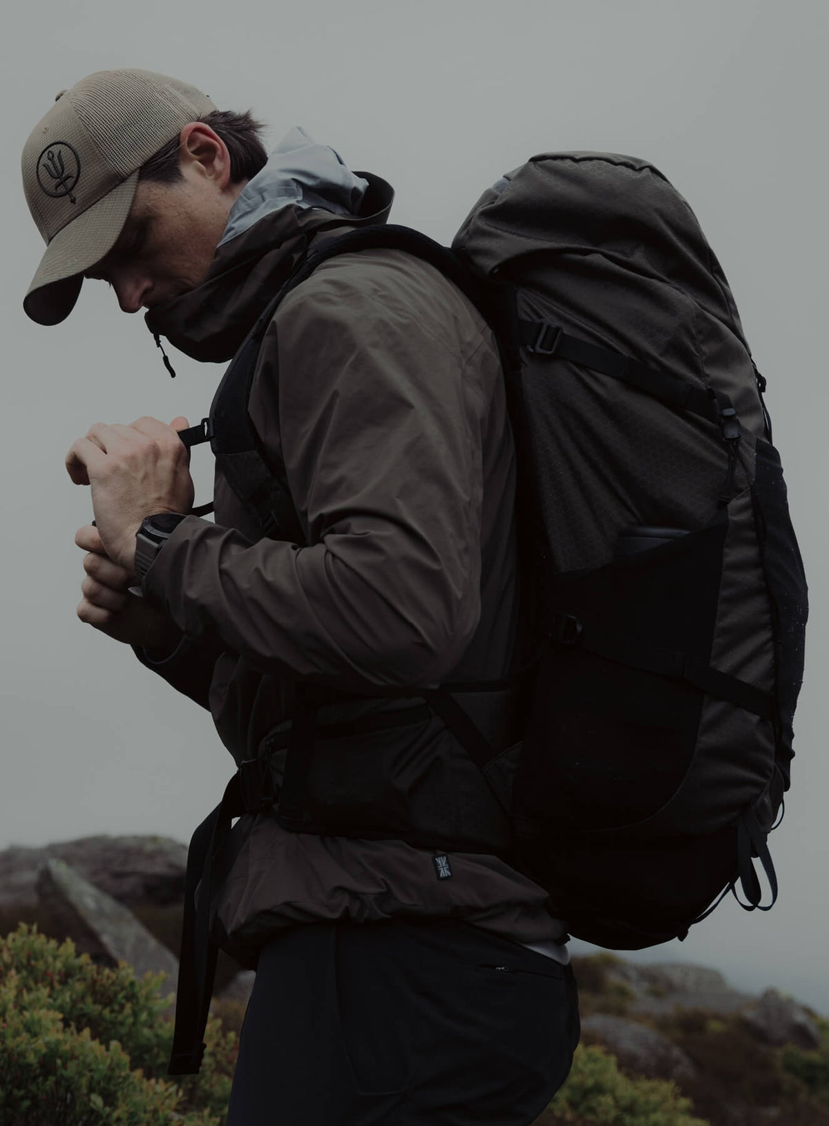 An in the field image of Pinnacle 42L Hiking Backpack in Obsidian Black (ITF)