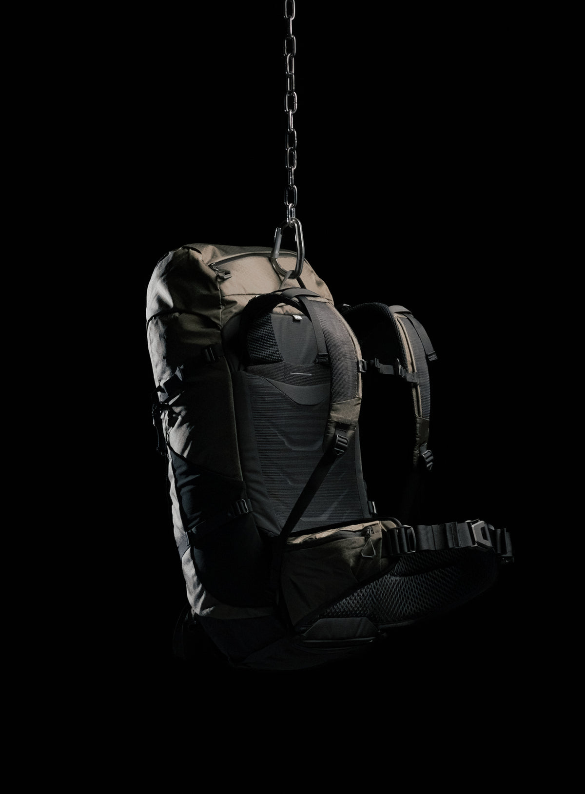 A creative studio shot of Pinnacle 42L Hiking Backpack in Olive Green (CS)