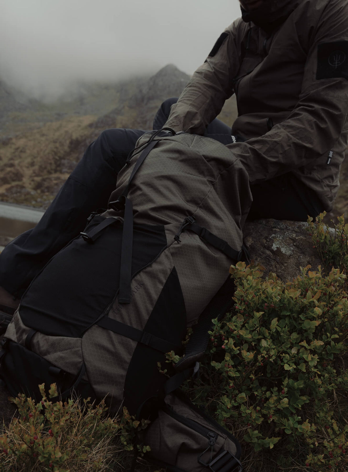 An in the field image of Pinnacle 42L Hiking Backpack in Olive Green (ITF)