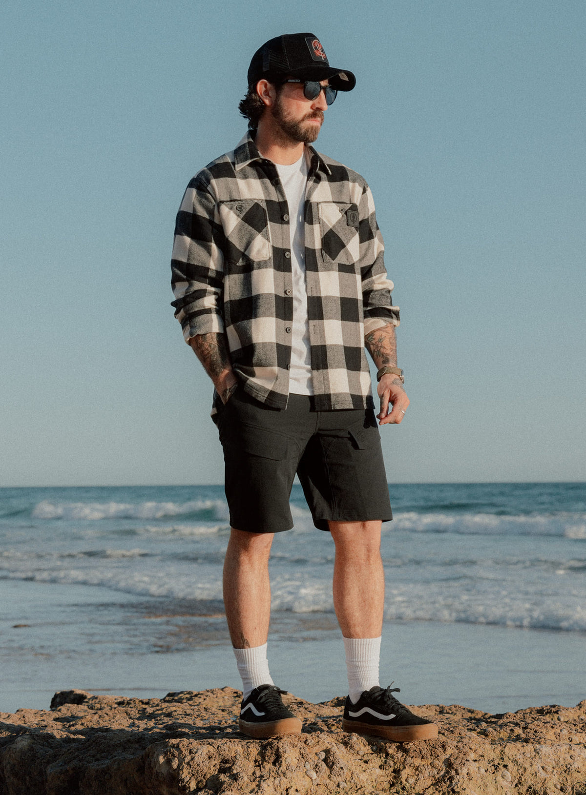 An in the field image of Men's Strike Shorts in Obsidian Black (ITF)