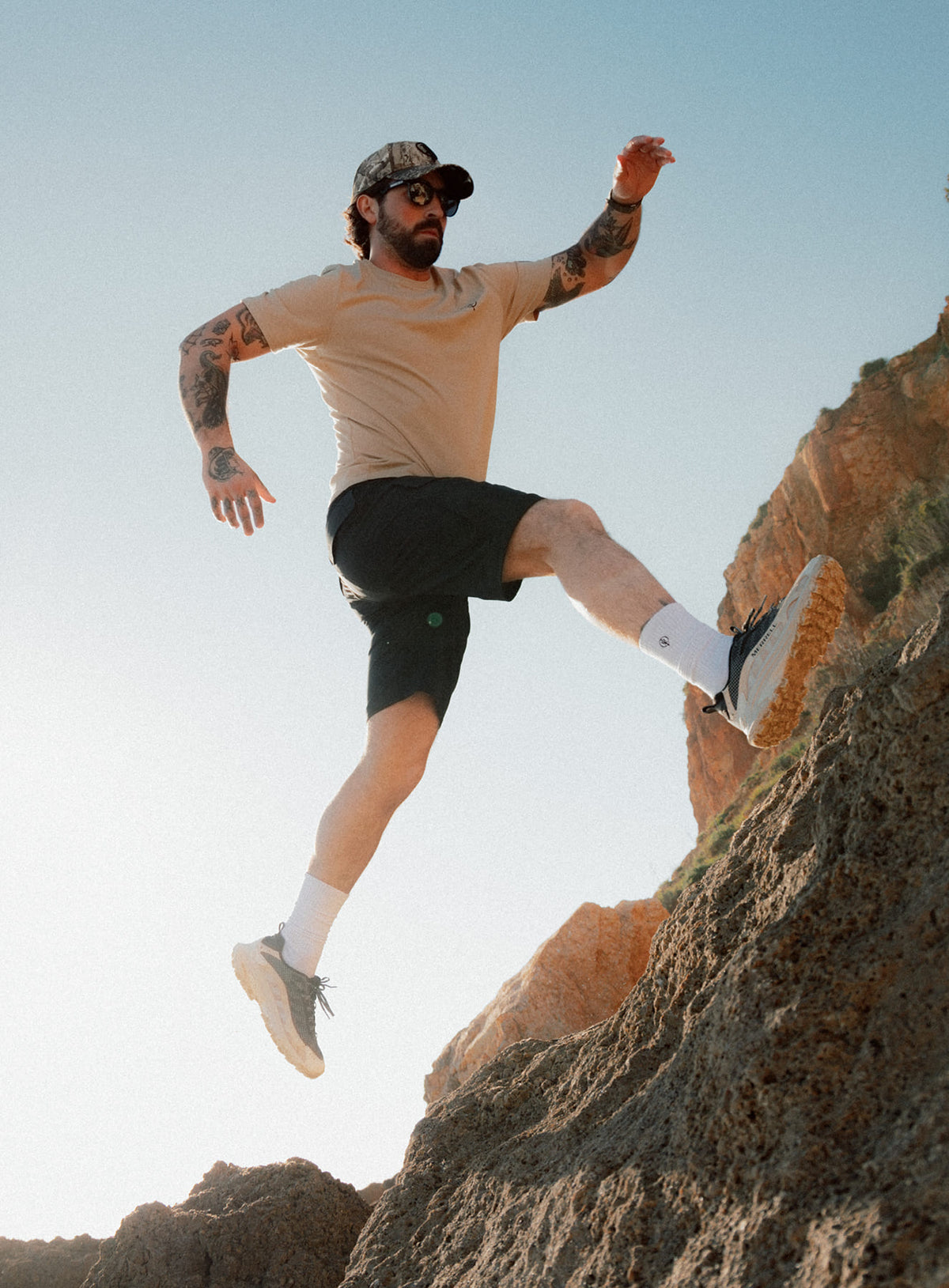 An in the field image of Men's Strike Shorts in Obsidian Black (ITF)