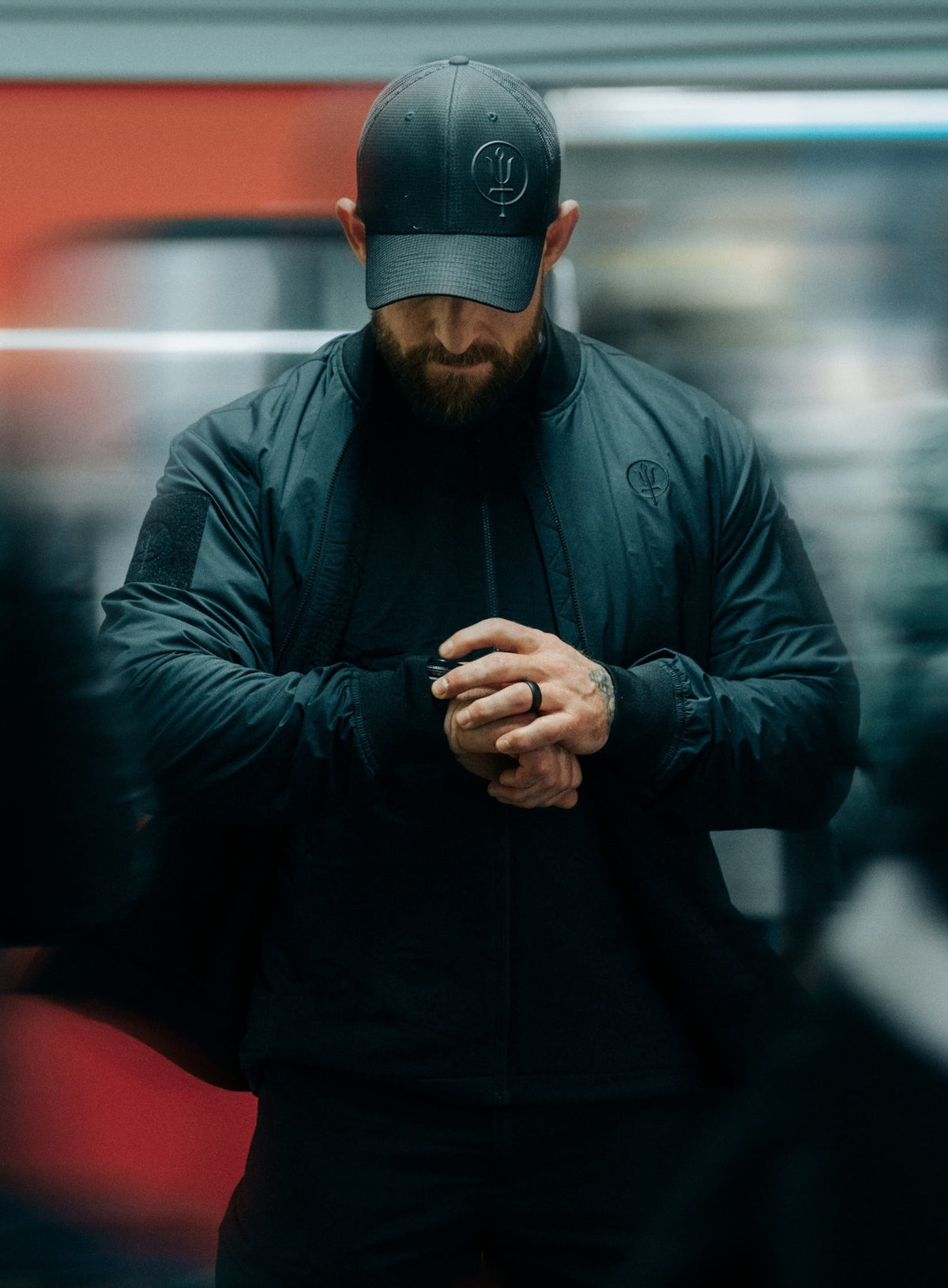 An in the field image of Men's Wraith Bomber Jacket in Obsidian Black (ITF)