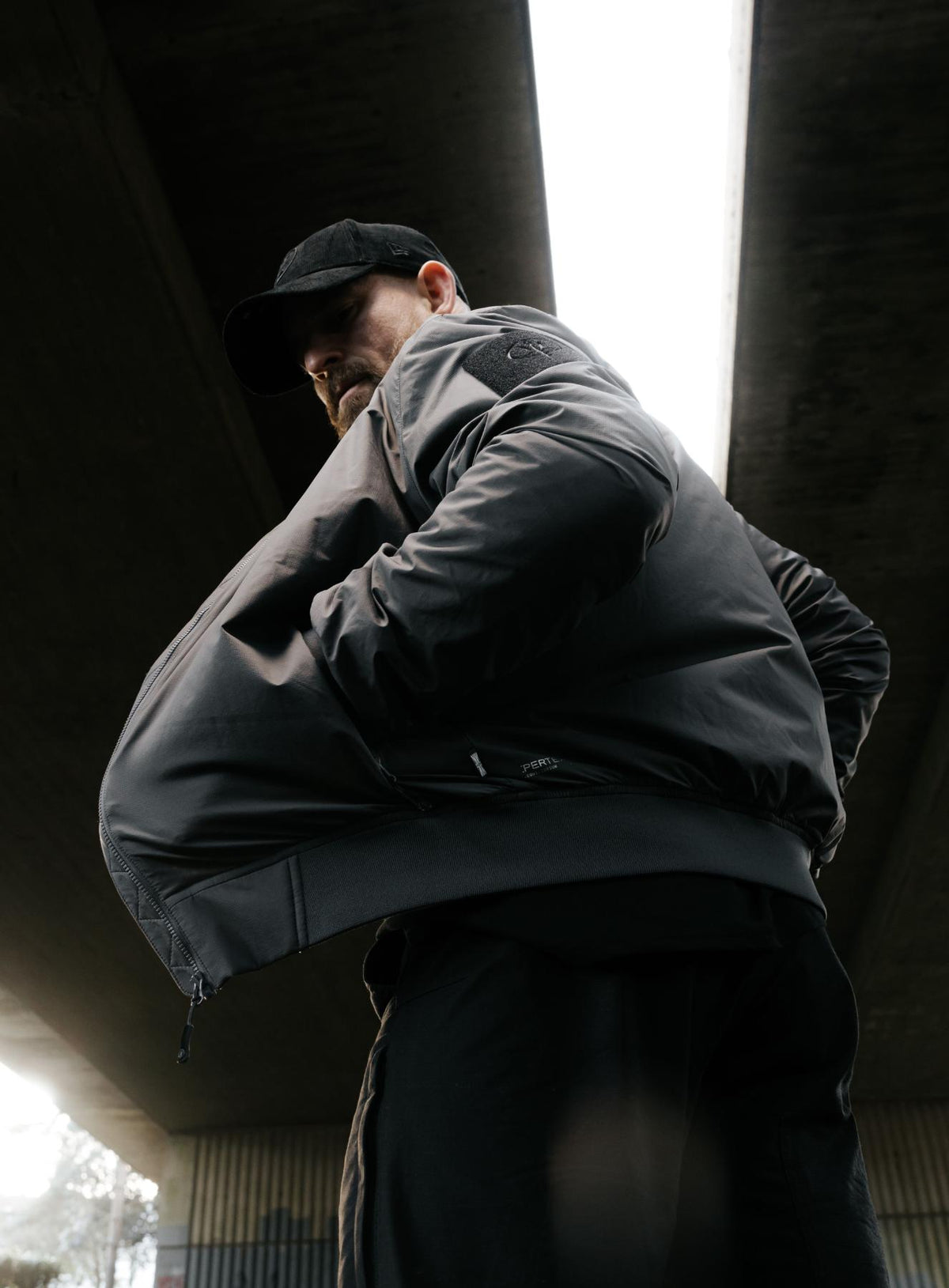 An in the field image of Men's Wraith Bomber Jacket in Raven Grey (ITF)